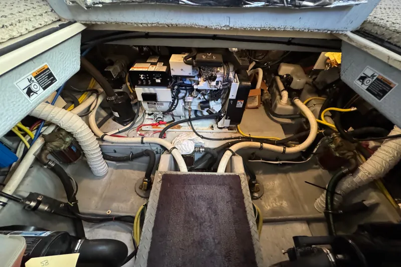 Slide: The Image of Engine room of 2005 Meridian 368 Motoryacht with visible wiring and machinery. - 59
