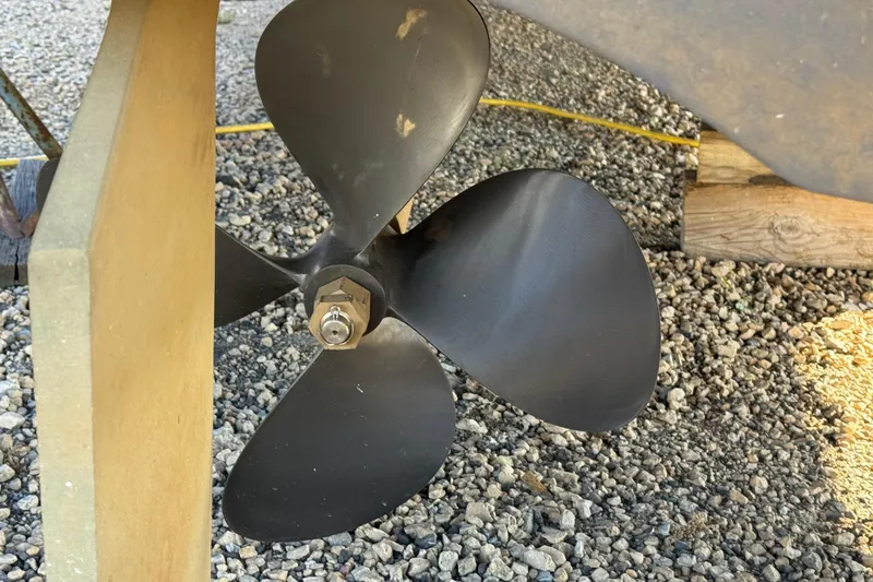 Slide: The Image of Propeller of 2005 Meridian 368 Motoryacht on gravel surface. - 72