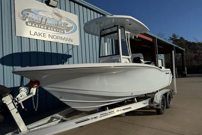 Slide: The Image of 2026 Tidewater 210 LXF boat on trailer at Foothills Marine Center, Lake Norman. - 2