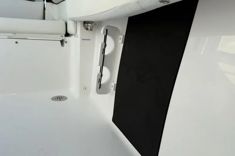 Slide: The Image of 2026 Tidewater 210 LXF boat interior detail with cup holders and seating. - 27