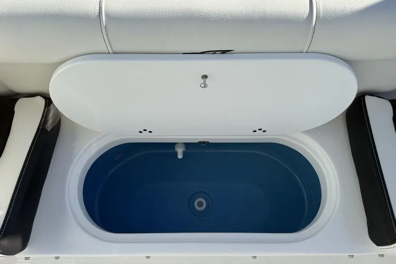 Slide: The Image of Livewell compartment on 2026 Tidewater 210 LXF boat, featuring a sleek design. - 31