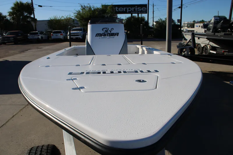 Slide: The Image of 2026 Mamba 227VX boat on trailer, displayed outdoors in a dealership lot. - 3
