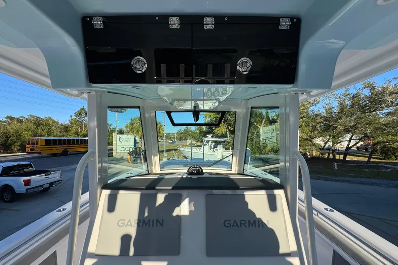 Slide: The Image of Interior view of 2026 Caymas 34 CT boat with Garmin navigation system. - 25