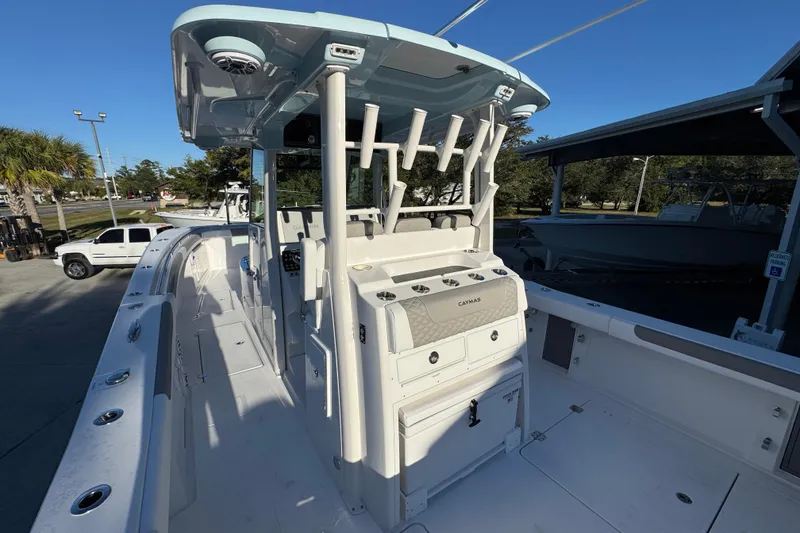 Slide: The Image of 2026 Caymas 34 CT boat interior with modern helm and seating. - 28