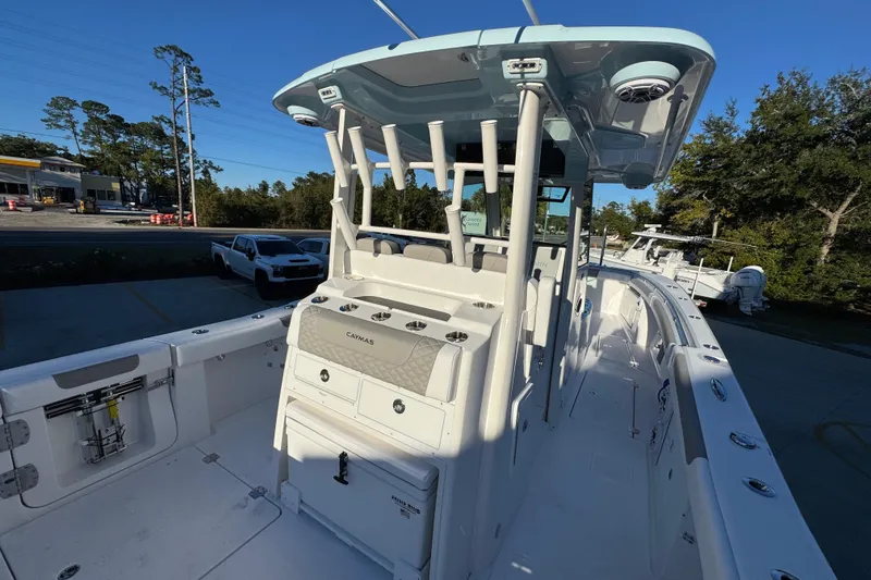 Slide: The Image of 2026 Caymas 34 CT boat interior with modern helm and seating. - 30