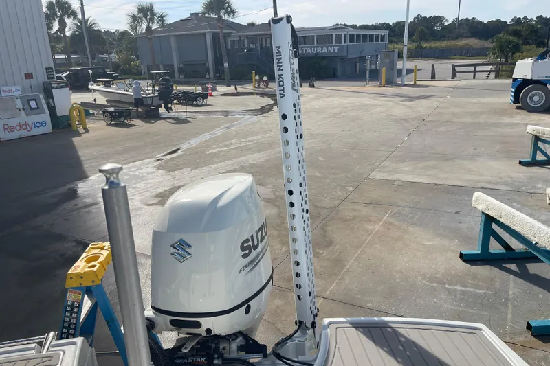 Slide: The Image of 2019 Crownline Eclipse E205 XS with Suzuki outboard at marina dock. - 25