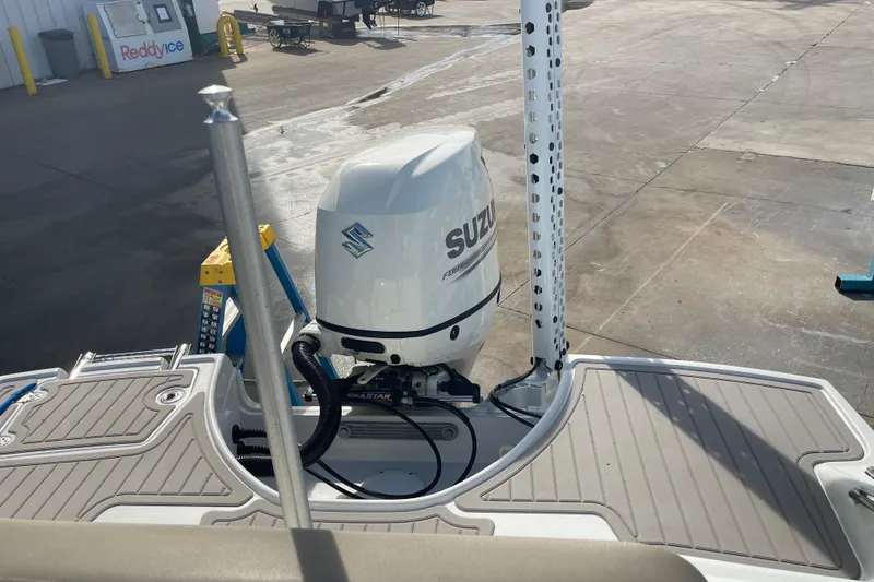 Slide: The Image of 2019 Crownline Eclipse E205 XS with Suzuki outboard motor on dock. - 26