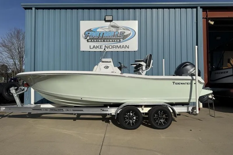 The Image of 2026 Tidewater 198 CC Adventure boat on trailer at Foothills Marine Center, Lake Norman. - 0