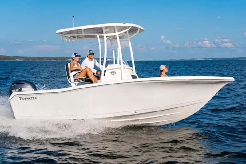 Slide: The Image of 2026 Tidewater 198 CC Adventure boat storage compartment with red cable and cleat. - 1