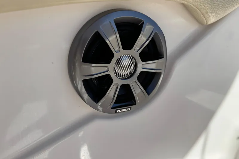 Slide: The Image of Speaker on 2020 Regal 1900 ES Bowrider boat, featuring Fusion audio system. - 25
