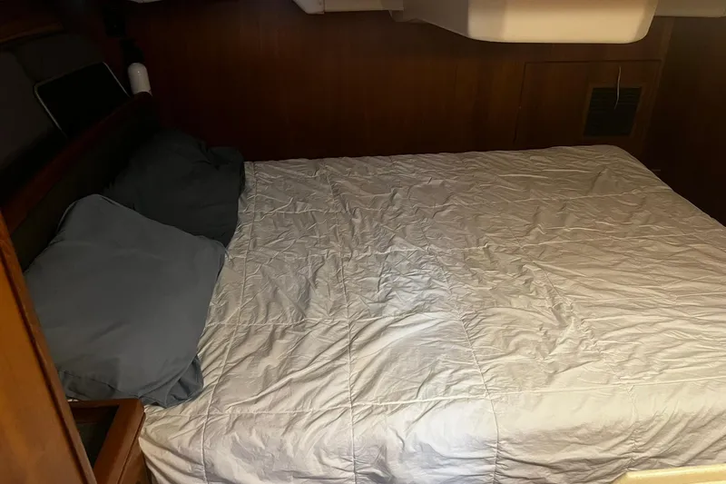 Slide: The Image of Cozy cabin bed in 2006 Hunter 41 Deck Salon sailboat interior. - 25