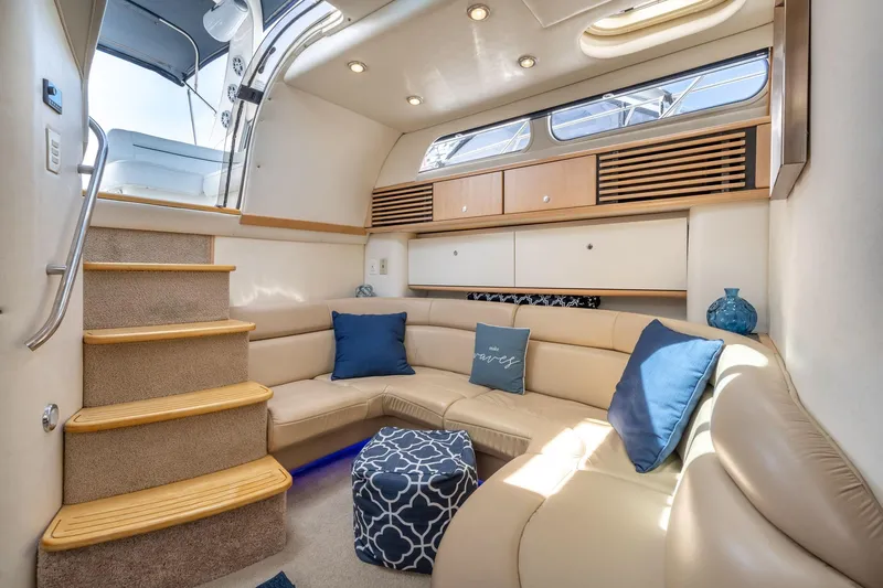 Slide: The Image of Luxurious interior of 1998 Avanti 4085 Sunbridge yacht with plush seating and elegant decor. - 18