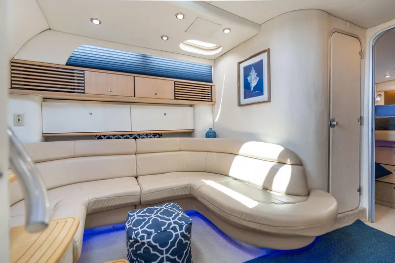 Slide: The Image of Luxurious interior of 1998 Avanti 4085 Sunbridge yacht with curved seating and modern decor. - 19