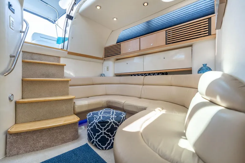 Slide: The Image of Luxurious interior of 1998 Avanti 4085 Sunbridge yacht with beige seating and elegant decor. - 20