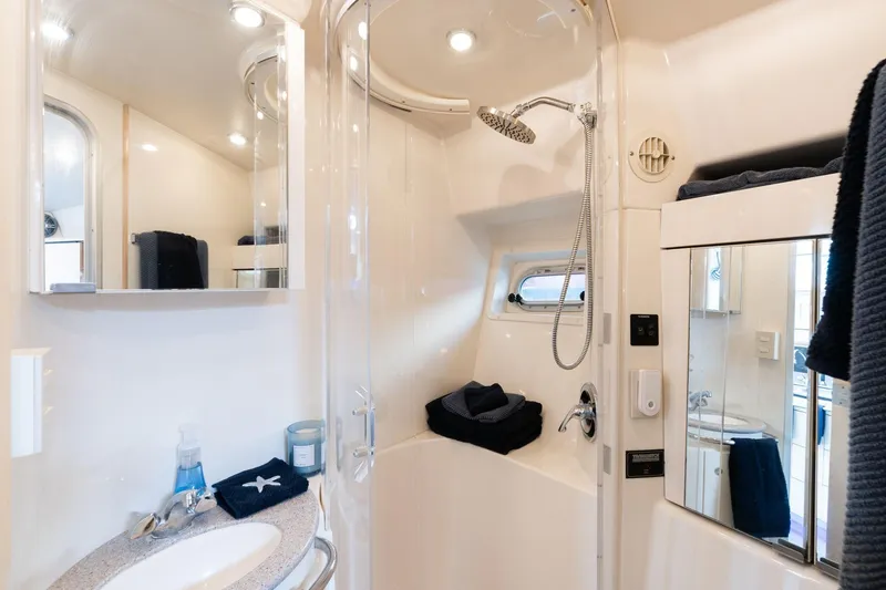Slide: The Image of Luxurious bathroom in 1998 Avanti 4085 Sunbridge yacht with modern fixtures. - 26