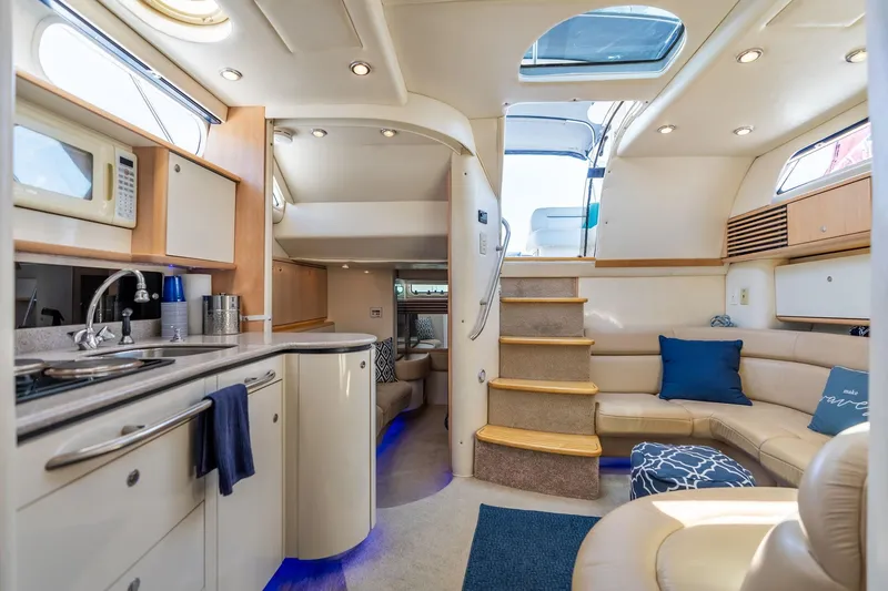 Slide: The Image of Luxurious interior of a 1998 Avanti 4085 Sunbridge yacht with modern amenities. - 27