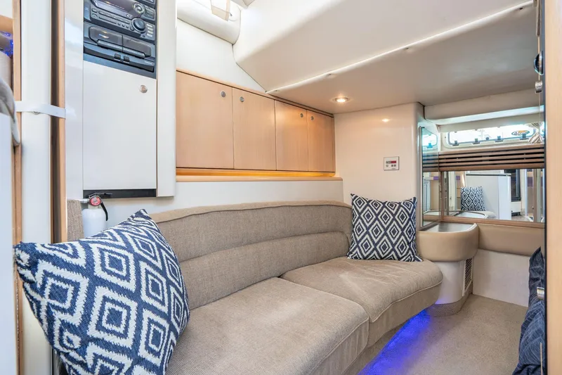 Slide: The Image of Interior of 1998 Avanti 4085 Sunbridge yacht with cozy seating and modern decor. - 29