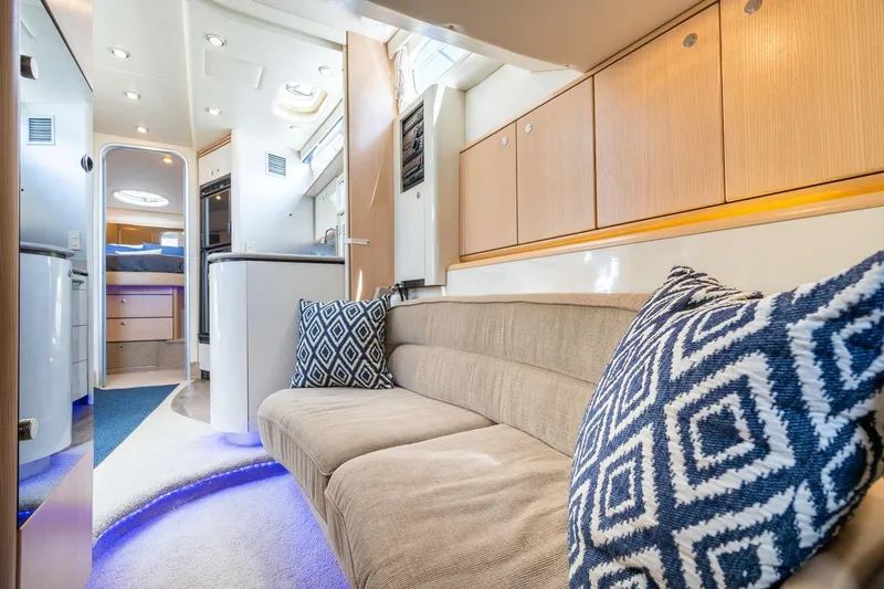 Slide: The Image of Luxurious interior of 1998 Avanti 4085 Sunbridge yacht with modern furnishings. - 31