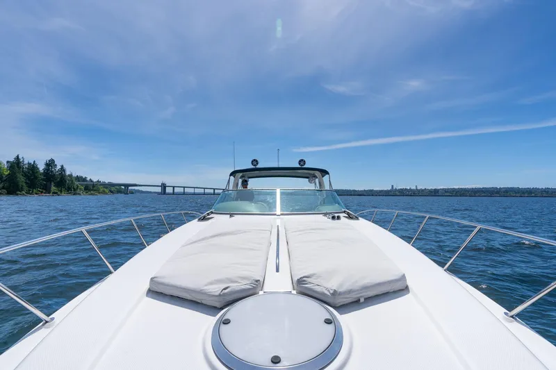 Slide: The Image of 1998 Avanti 4085 Sunbridge yacht cruising on a sunny day with clear blue skies. - 38