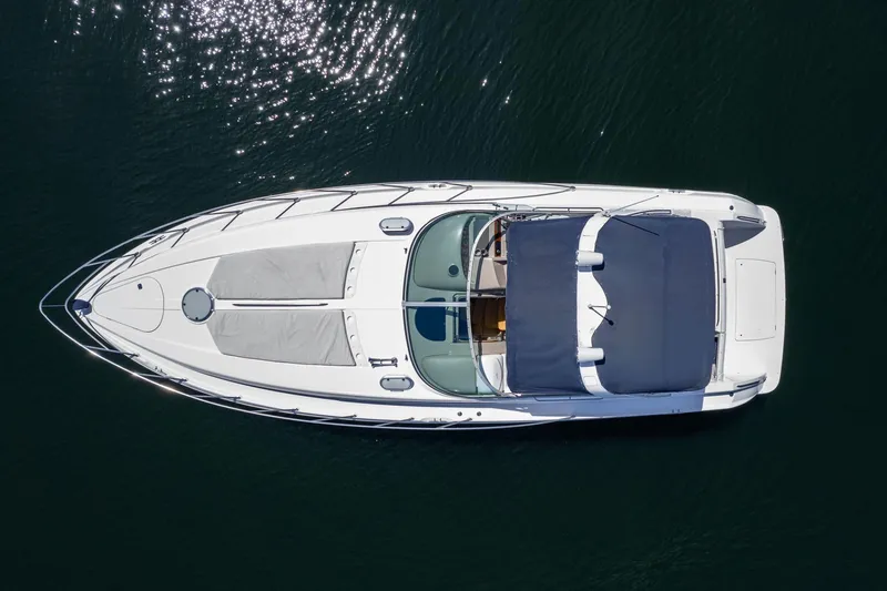 Slide: The Image of Overhead view of 1998 Avanti 4085 Sunbridge yacht on water. - 43