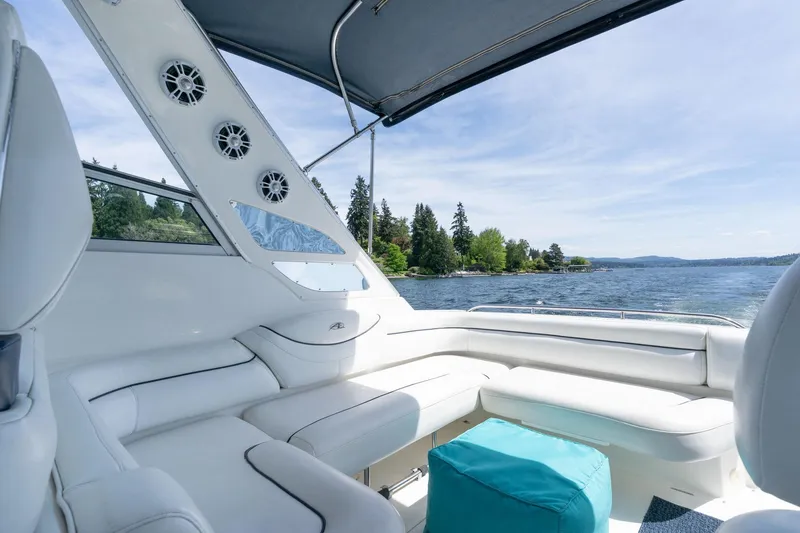 Slide: The Image of Luxurious 1998 Avanti 4085 Sunbridge yacht interior with white seating, scenic lake view. - 7