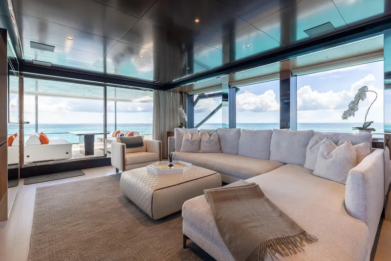 Slide: The Image of Luxurious interior of 2020 Riva 90 Argo yacht with ocean view and elegant furnishings. - 16