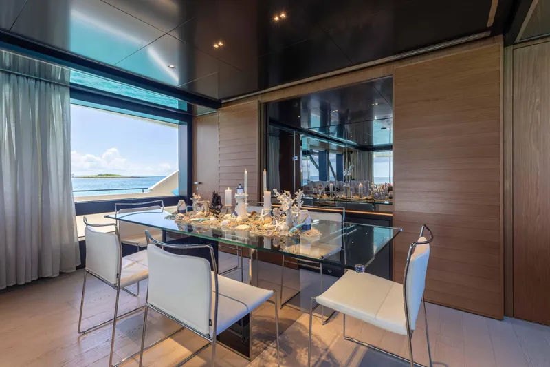 Slide: The Image of Luxurious dining area on 2020 Riva 90 Argo yacht with ocean view. - 19