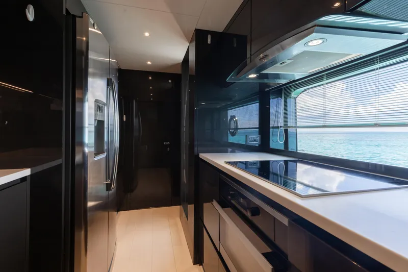 Slide: The Image of Modern kitchen interior on 2020 Riva 90 Argo yacht with ocean view. - 21