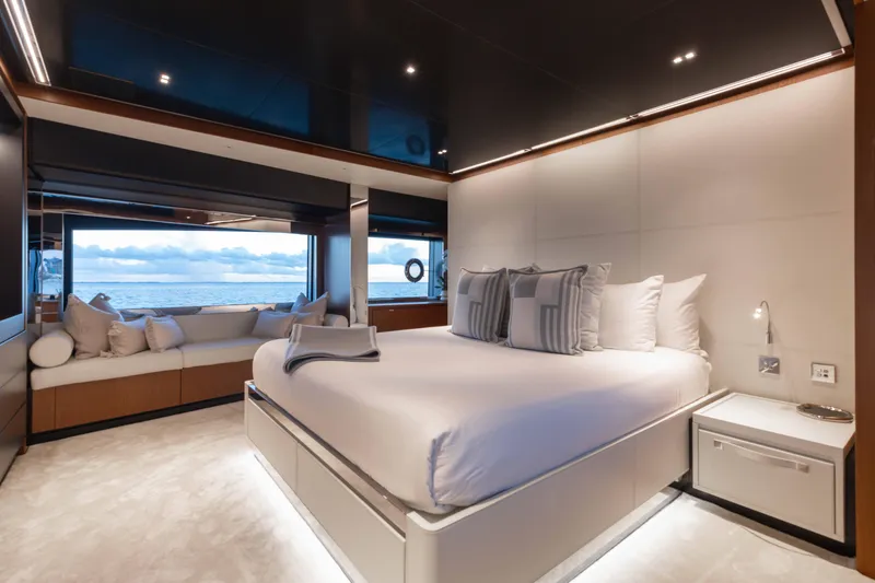 Slide: The Image of Luxurious bedroom interior on 2020 Riva 90 Argo yacht with ocean view. - 25