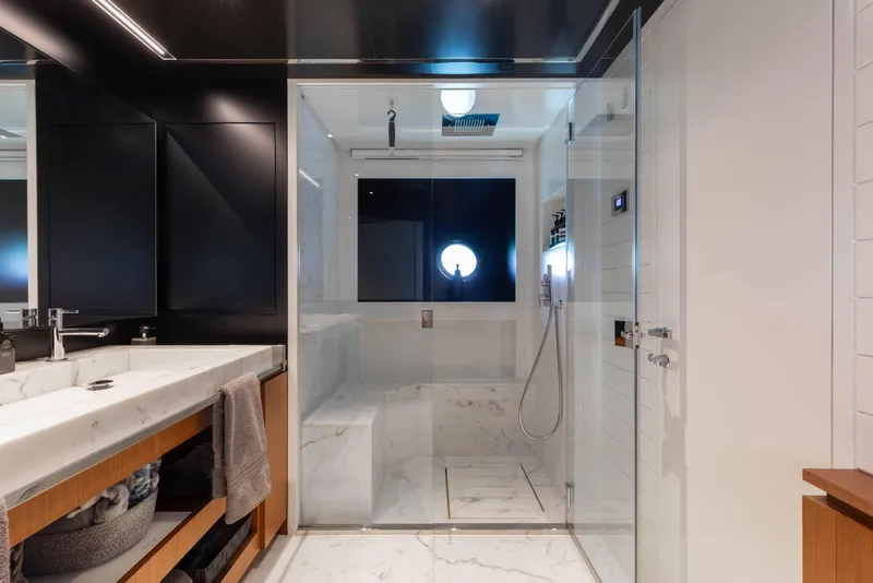 Slide: The Image of Luxurious bathroom on 2020 Riva 90 Argo yacht with marble shower and modern fixtures. - 30