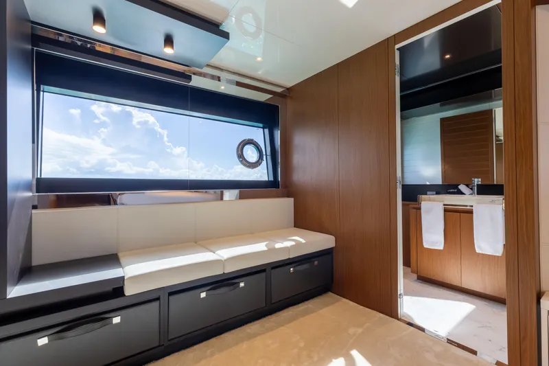 Slide: The Image of Luxurious interior of 2020 Riva 90 Argo yacht with modern seating and bathroom. - 34