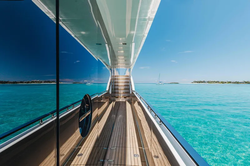 Slide: The Image of Luxurious Riva 90 Argo yacht deck with stunning turquoise ocean view, 2020 model. - 43