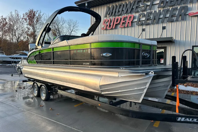 Slide: The Image of 2017 Manitou Xplode 250 pontoon boat on trailer at Midwest Boat Super Center. - 14