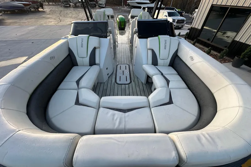 Slide: The Image of 2017 Manitou Xplode 250 pontoon boat with spacious seating and modern design. - 23
