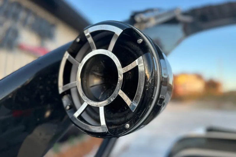 Slide: The Image of Close-up of a 2017 Manitou Xplode 250 boat speaker with metallic grille. - 28