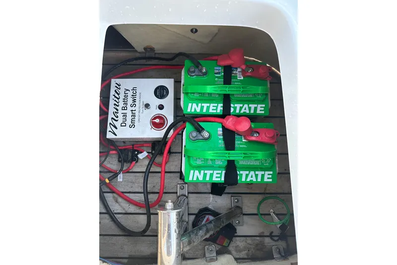 Slide: The Image of 2017 Manitou Xplode 250 battery setup with dual Interstate batteries and smart switch. - 31
