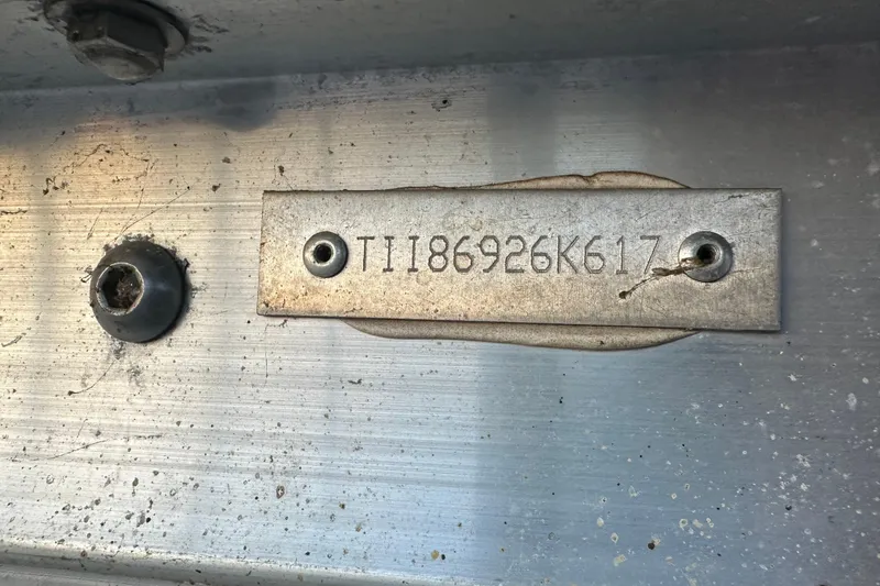 Slide: The Image of 2017 Manitou Xplode 250 serial number plate on metallic surface. - 34