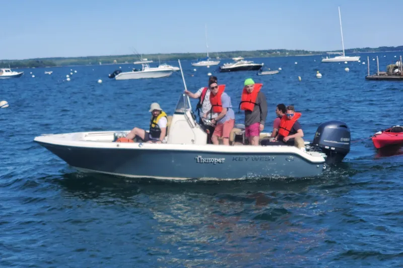 Slide: The Image of 2018 Key West 189 FS boat with passengers wearing life jackets on a sunny day. - 3