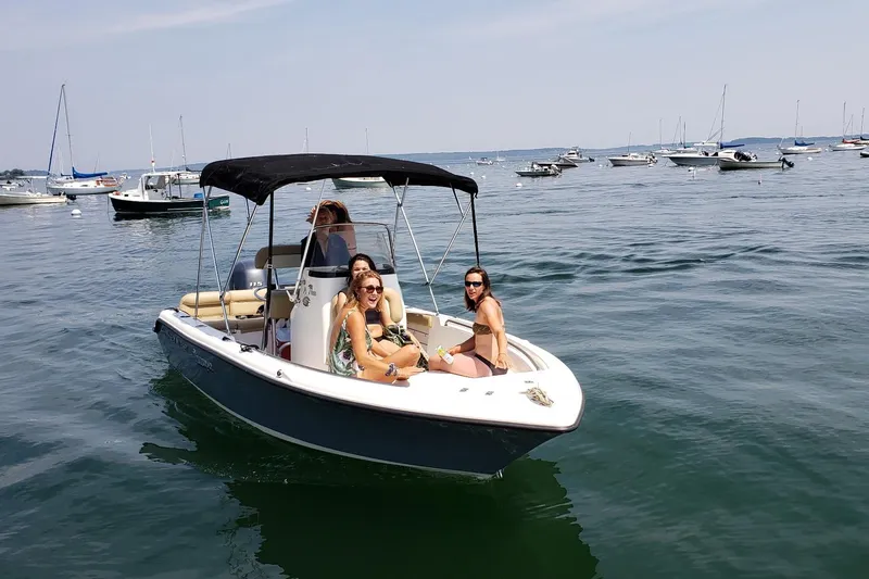 Slide: The Image of 2018 Key West 189 FS boat with passengers enjoying a sunny day on the water. - 6