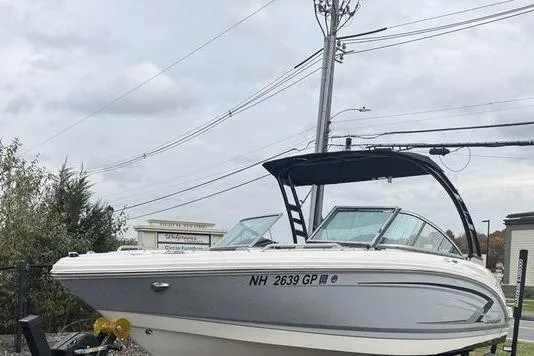 Slide: The Image of 2023 Chaparral 23 SSi boat engine, featuring a powerful 6.2L 300 horsepower motor. - 6