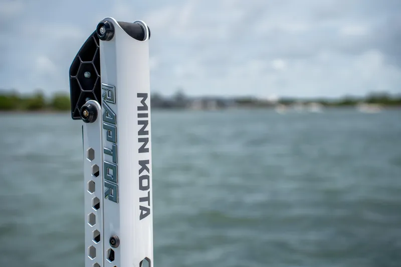 Slide: The Image of Minn Kota Raptor anchor on 2021 Intrepid 345 Nomad FE, with water in the background. - 20