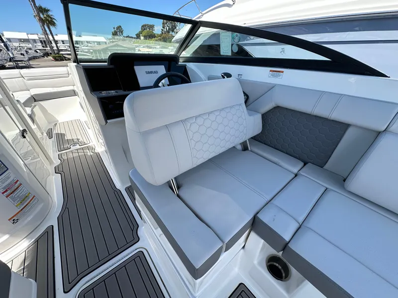Slide: The Image of 2024 Sea Ray SDX 270 Outboard interior with sleek seating and modern design. - 10