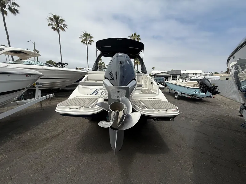 Slide: The Image of 2024 Sea Ray SDX 270 Outboard boat displayed in a marina setting. - 5