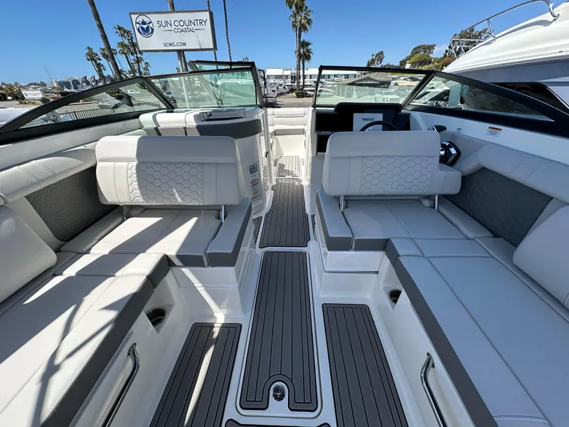 Slide: The Image of 2024 Sea Ray SDX 270 Outboard interior with luxurious seating and modern design. - 9