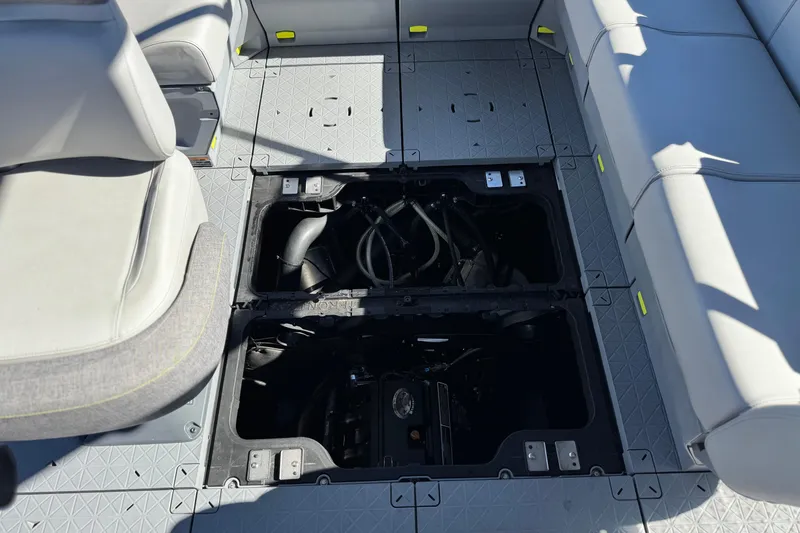 Slide: The Image of 2023 Sea-Doo Switch Cruise 21 interior showing open storage compartments and seating. - 20