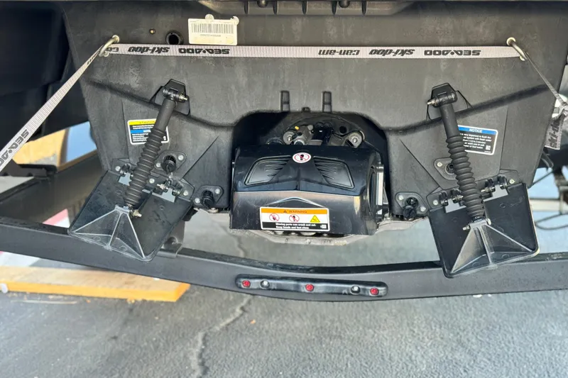 Slide: The Image of 2023 Sea-Doo Switch Cruise 21 engine and steering components close-up. - 9