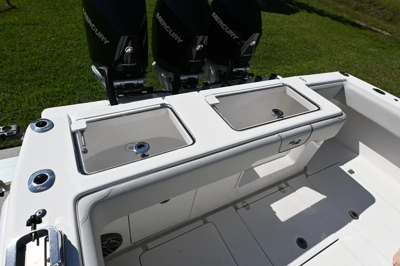Slide: The Image of 2024 SeaVee 340Z boat with dual Mercury engines and spacious deck layout. - 12