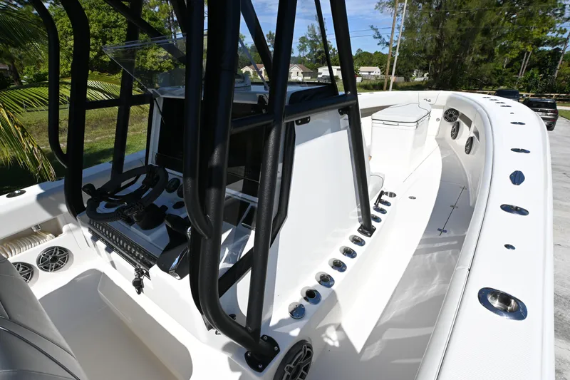 Slide: The Image of 2024 SeaVee 340Z boat interior with modern console and seating. - 17