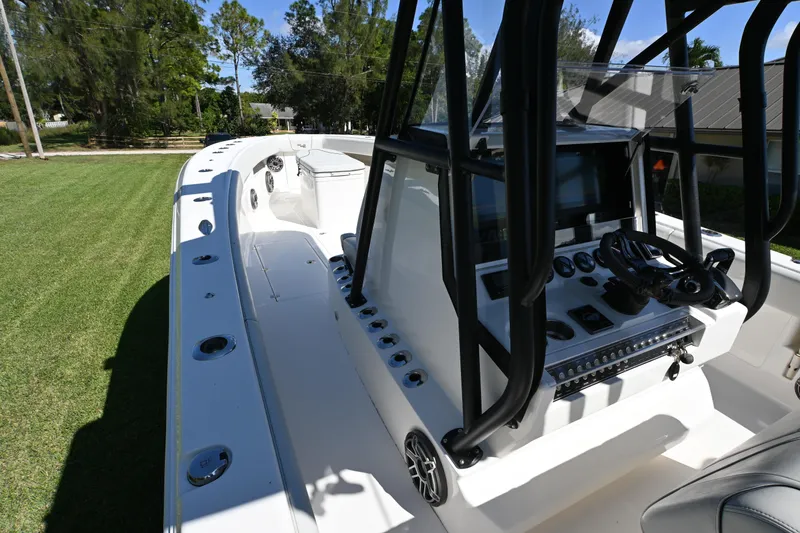 Slide: The Image of 2024 SeaVee 340Z boat interior with modern console and spacious deck. - 18