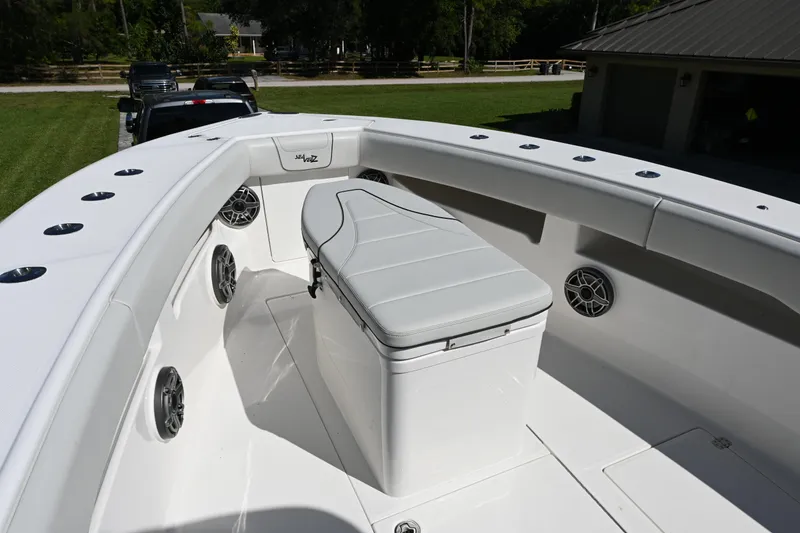 Slide: The Image of 2024 SeaVee 340Z boat interior with seating and speakers, showcasing modern design. - 20